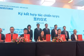 En la ceremonia de firma entre el NSSC y el CCPIT (Foto: VNA)