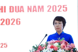 La secretaria del Comité del Partido y directora general de la VNA, Vu Viet Trang, interviene en la cita. (Foto: VNA)