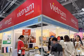 En el pabellón de Vietnam (Foto: VNA)