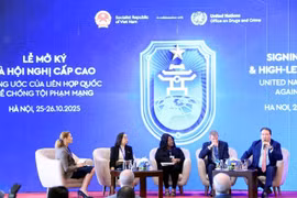 Delegados debaten en la cita (Foto: VNA)
