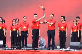 Ceremonia de entrega de la antorcha. (Fuente: VNA)