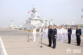 Fuerzas navales vietnamitas y chinas realizan patrulla conjunta. (Fuente: qdnd)