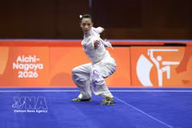 Duong Thuy Vi conquista la medalla de bronce en la prueba combinada de jianshu y qiangshu. (Fuente: VNA)