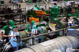 La Zona de Procesamiento de Exportación de Tan Thuan se conecta con el Puerto de Tan Thuan para formar un ecosistema de producción y exportación en Ciudad Ho Chi Minh. (Foto: VNA)