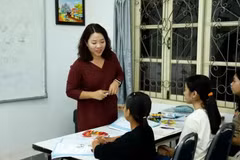Una clase de vietnamita en Laos. (Foto: VNA)
