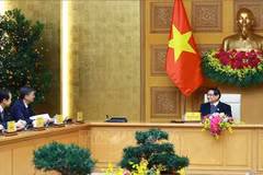 El primer ministro de Vietnam, Pham Minh Chinh, recibe a Chen Gang, secretario del Comité del Partido Comunista de China en Guangxi. (Fuente: VNA)