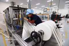 Cadena de producción en la empresa Malpensa Plant Vietnam, con 100% capital japonés. Foto: VNA