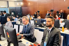 Representantes internacionales siguen el desarrollo del XIV Congreso Nacional del PCV en el Centro Nacional de Convenciones. (Foto: VNA)