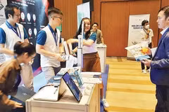 Empresas exhiben soluciones de transformación digital en el festival de transformación digital de Ciudad Ho Chi Minh. (Foto: nhandan.vn)