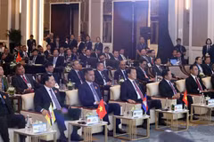 El ministro de Seguridad Pública de Vietnam, general Luong Tam Quang, y delegados en el evento. (Fuente: cand.vn)