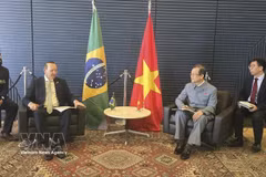 En la reunión entre Le Hong Quang, miembro del Comité Central del Partido Comunista de Vietnam y subdirector de su Comisión de Asuntos Internos, y representantes del Grupo Parlamentario de Amistad Brasil-Vietnam. (Fuente: VNA)