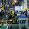 El grupo THACO invierte y aplica numerosas tecnologías y maquinaria avanzadas para mejorar la productividad y la calidad de sus productos automotrices. (Foto: VNA) 