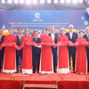 Los delegados realizan la ceremonia de corte de cinta. (Foto: VNA)