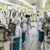 La moderna línea de producción de Hana Micron Vina, una empresa con capital surcoreano, ubicada en el Parque Industrial Van Trung (Foto: VNA)