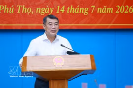El primer ministro Le Minh Hung en la reunión. (Foto: VNA)
