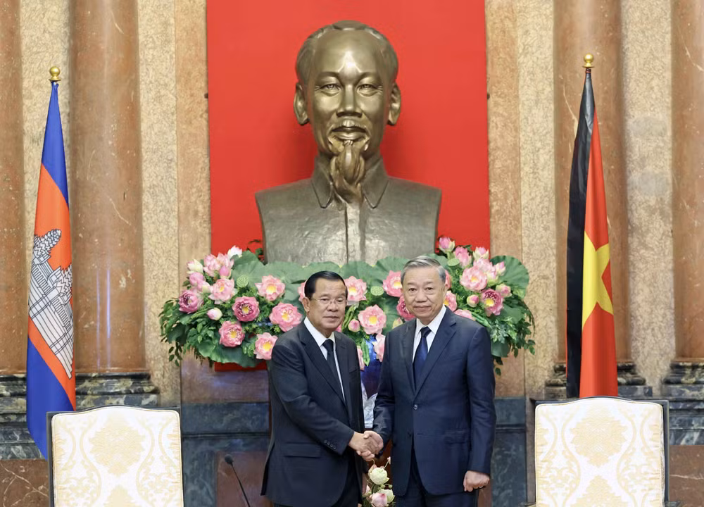 vna_potal_chu_tich_nuoc_to_lam_tiep_chu_tich_dang_nhan_dan_campuchia_hun_sen_7501138.jpg