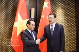 El ministro de Agricultura y Medio Ambiente de Vietnam, Trinh Viet Hung, y su par chino de Agricultura y Asuntos Rurales, Zhang Zhu. Foto: VNA
