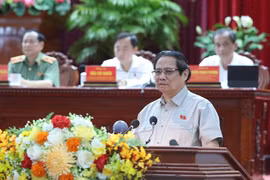 El primer ministro de Vietnam, Pham Minh Chinh, habla en la reunión con los votantes de Can Tho. (Fuente: VNA)
