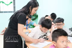 Una clase dedicada a niños con discapacidades auditivas y del habla en la provincia de Bac Ninh. (Foto: VNA)