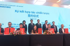 En la ceremonia de firma entre el NSSC y el CCPIT (Foto: VNA)