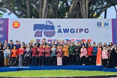 Delegados participantes en el encuentro (Foto: VNA)
