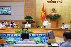 El primer ministro de Vietnam, Le Minh Hung, interviene en la cita. (Foto: VNA)