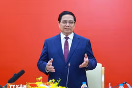 El primer ministro Pham Minh Chinh habla en la reunión. (Foto: VNA)