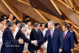 El secretario general del Partido Comunista de Vietnam y presidente de la República, To Lam, y los delegados en la cita. (Foto: VNA)