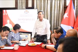 El embajador Le Quang Long habla en la cita. (Foto: VNA)