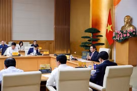 El primer ministro de Vietnam, Pham Minh Chinh, preside la reunión sobre el desarrollo de un comercio equilibrado y sostenible con Estados Unidos. (Foto: VNA(