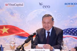 El secretario general del Partido y presidente de Vietnam, To Lam, en un diálogo con dirigentes de instituciones financieras y fondos de inversión estadounidenses. (Foto: VNA)