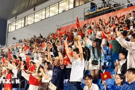 Aficionados vietnamitas celebran la victoria frente a Filipinas. (Foto: Vietcontent)