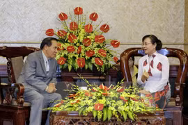 Ciudad Ho Chi Minh y Vientiane fortalecen cooperación entre organizaciones de masas