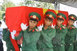 Vietnam y Laos cooperan en búsqueda de restos de combatientes