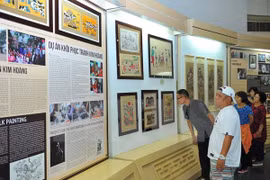 Promueven en Vietnam valores de pinturas folclóricas vietnamitas