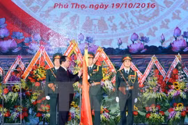 Condecoraciones laosianas a excombatientes internacionalistas vietnamitas