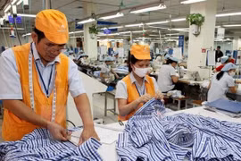 Diálogo comercial entre localidades vietnamita y china