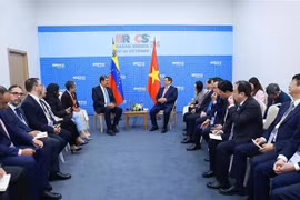 El primer ministro de Vietnam, Pham Minh Chinh, y el presidente de Venezuela, Nicolás Maduro. (Foto: VNA)