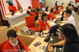 Aplican tecnologías 4.0 en sector bancario de Vietnam