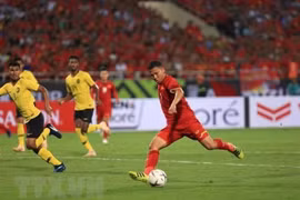 Fútbol: Amplio eco de prensa internacional de victoria aplastante de Vietnam sobre Malasia