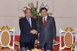 Vietnam y Laos acuerdan impulsar la implementación de acuerdos sellados