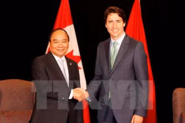 Aprovechan Vietnam y Canadá oportunidades para promover intercambio comercial