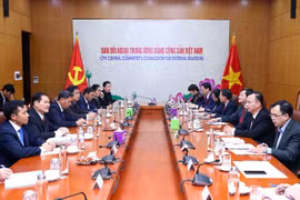 Vietnam y Laos comparten experiencia de movilización de masas