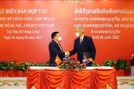 Hanoi y Vientiane firman acuerdo para fomentar cooperación 