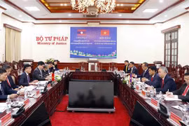 Ministerios de Justicia de Vietnam y Laos mejoran eficiencia de cooperación 