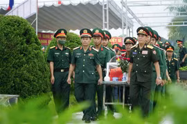 Realizan en Vietnam acto de entierro de soldados caídos en Laos