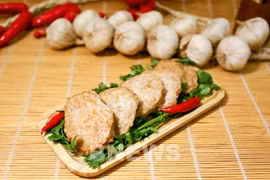 Salchichas de copos de arroz glutinoso verde, plato especial de Hanoi