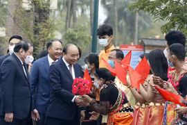 Presidente vietnamita asiste al festival primaveral de solidaridad nacional 