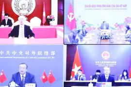 Agilizan nexos entre Partidos Comunistas de Vietnam y China