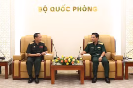 Ministerios de Defensa de Vietnam y Laos agilizan lazos en información